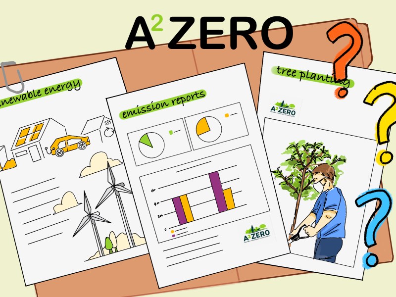 Illustration of an open file folder with "A2 Zero written above it. The papers in the folder are labelled "renewable energy", "emission reports" and "tree planting".