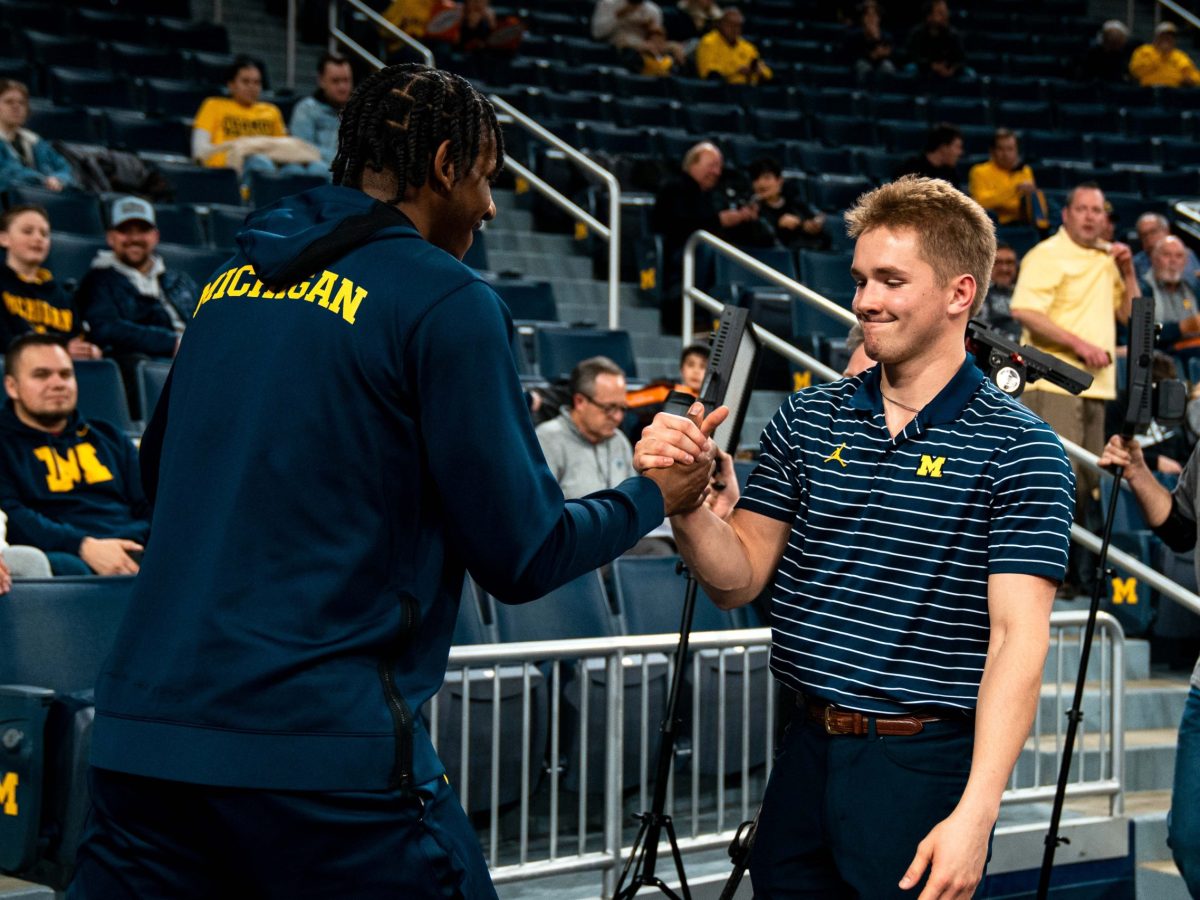 Photo Essay: Michigan Basketball Managers, an extension of the family